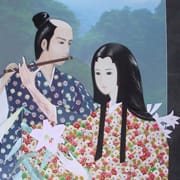笛を吹いている景頼と百合の花を持っている佐葦姫のイラスト